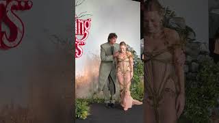 Margot Robbie & Jacob Elordi caught in the rain at the "WUTHERING HEIGHTS" UK Premiere